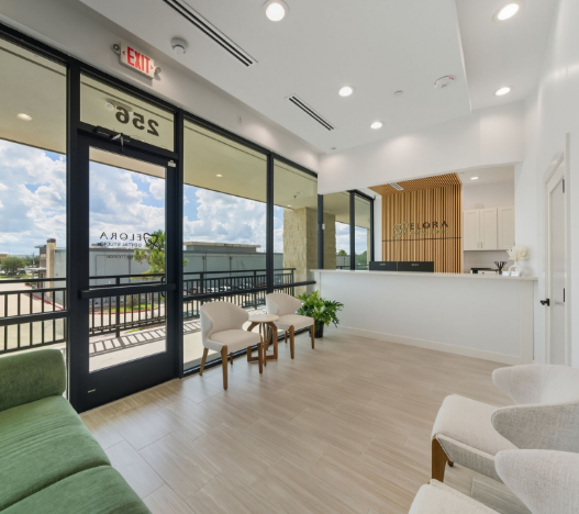 Smiling senior man giving a thumbs up in the dental chair