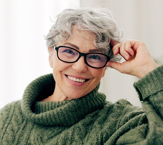 A woman smiling