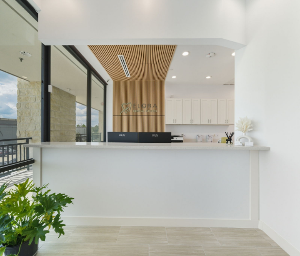 Smiling woman sitting in the dental chair